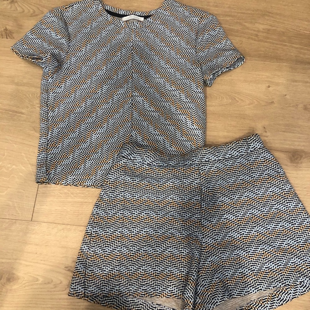 Two piece short and shirt set.